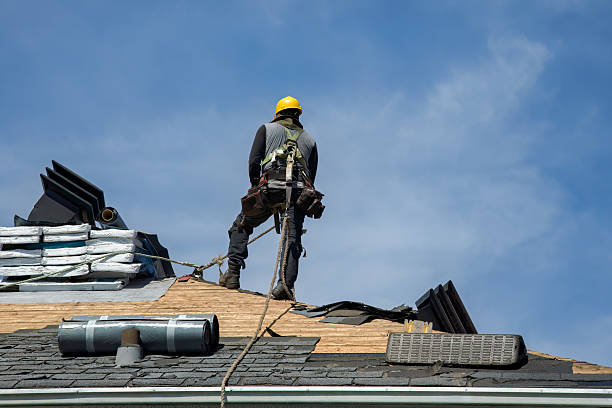 Professional Storm Damage Roof Repair technician working in Feeding Hills, MA